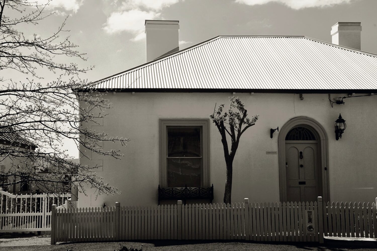 A house with wooden fence and two chimney, a part of ARTISAN Magazine Vol. 3