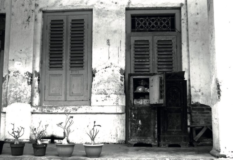 A door blocked by old cupboard with several pot in front, a part of ARTISAN Magazine Vol. 3