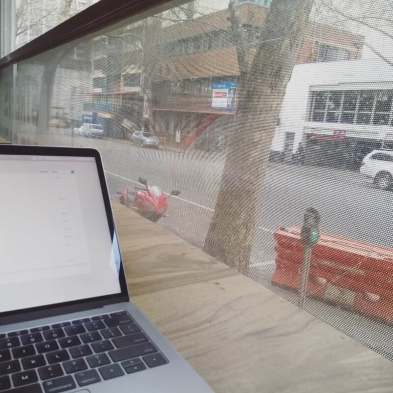 a laptop near a window